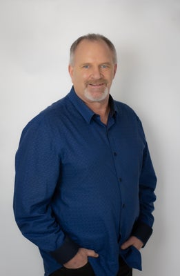 Portrait of Corey Christenson, Associate, SRES®.